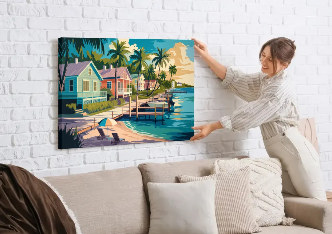 Key West Florida Coastline canvas wall art being hung on a white brick wall above a sofa