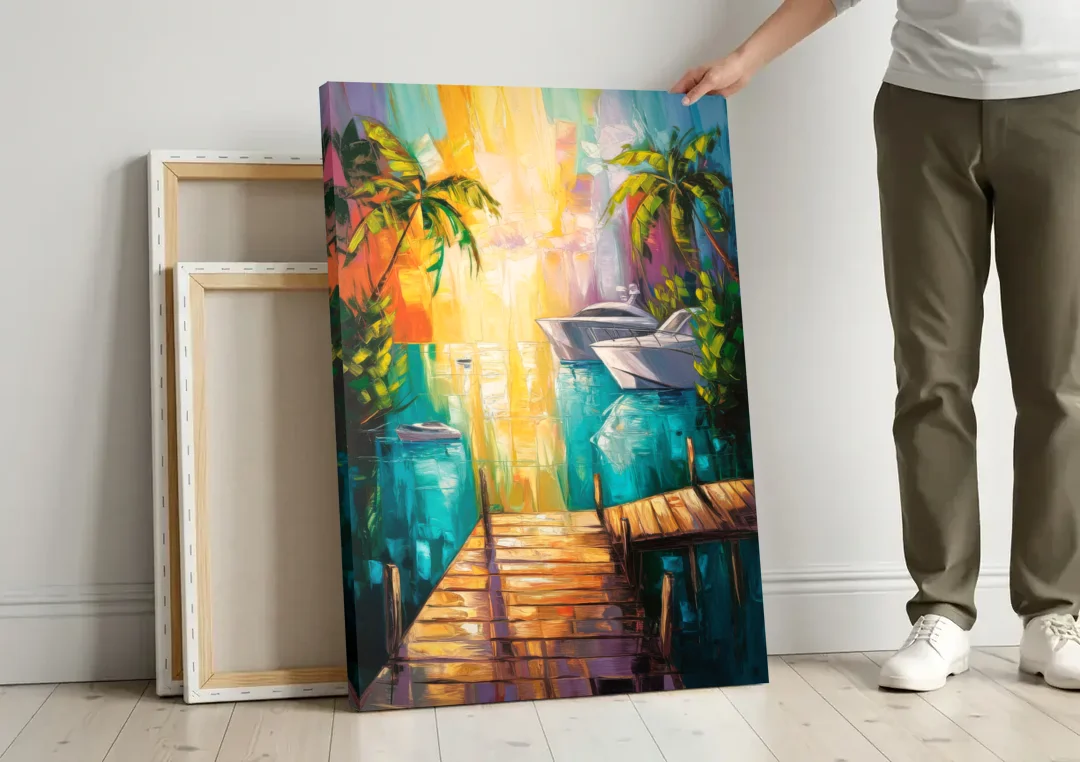 Key West Harbor Views canvas wall art leaning against a wall next to blank canvases