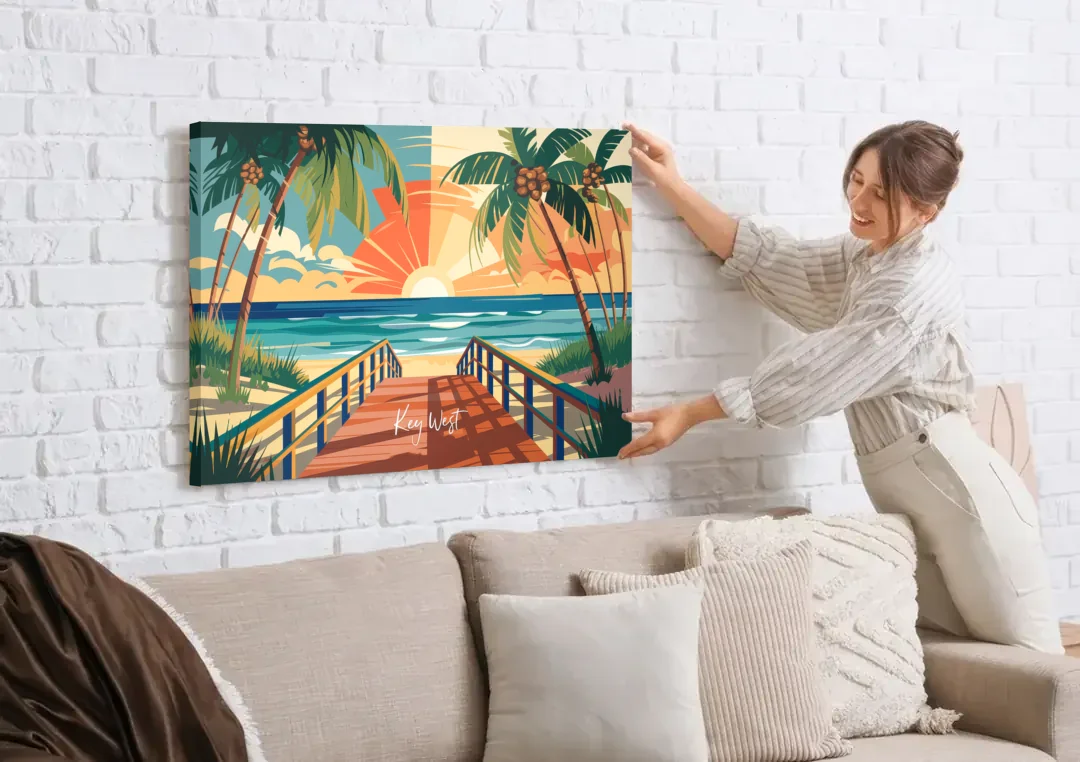 Key West Ocean Breeze canvas wall art being hung on a white brick wall above a sofa