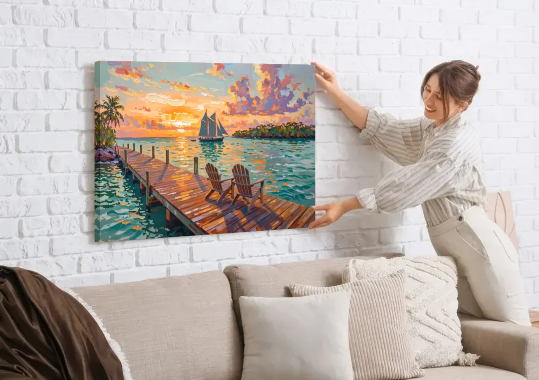 Key West Tropical Sunset canvas wall art being hung on a white brick wall above a sofa