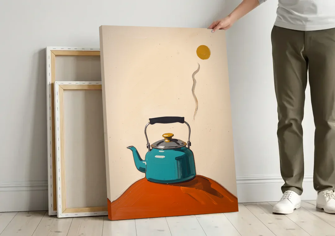 Kitchen Canvas Prints Teal Kettle with Steam Curl canvas wall art leaning against a wall next to blank canvases