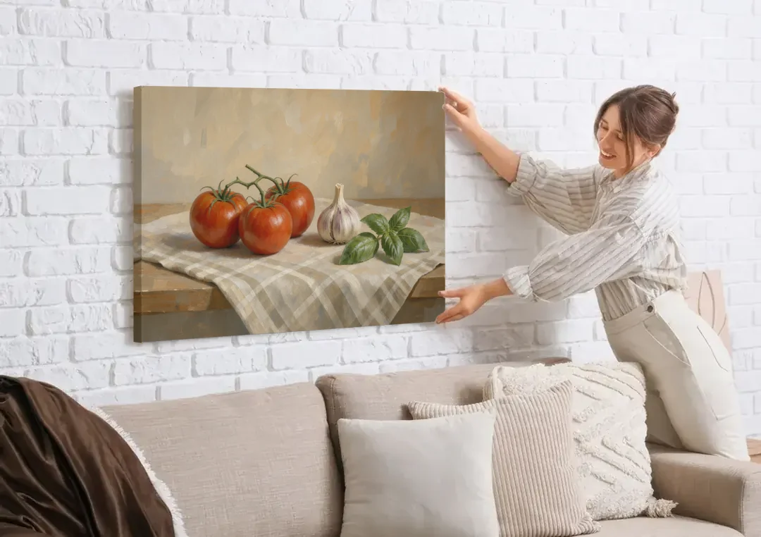 Kitchen Wall Art Canvas of Vine Tomatoes and Garlic canvas wall art being hung on a white brick wall above a sofa