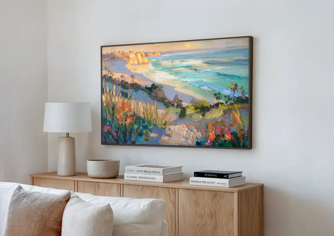 La Jolla Pacific Blues canvas wall art above a wooden sideboard next to a sofa