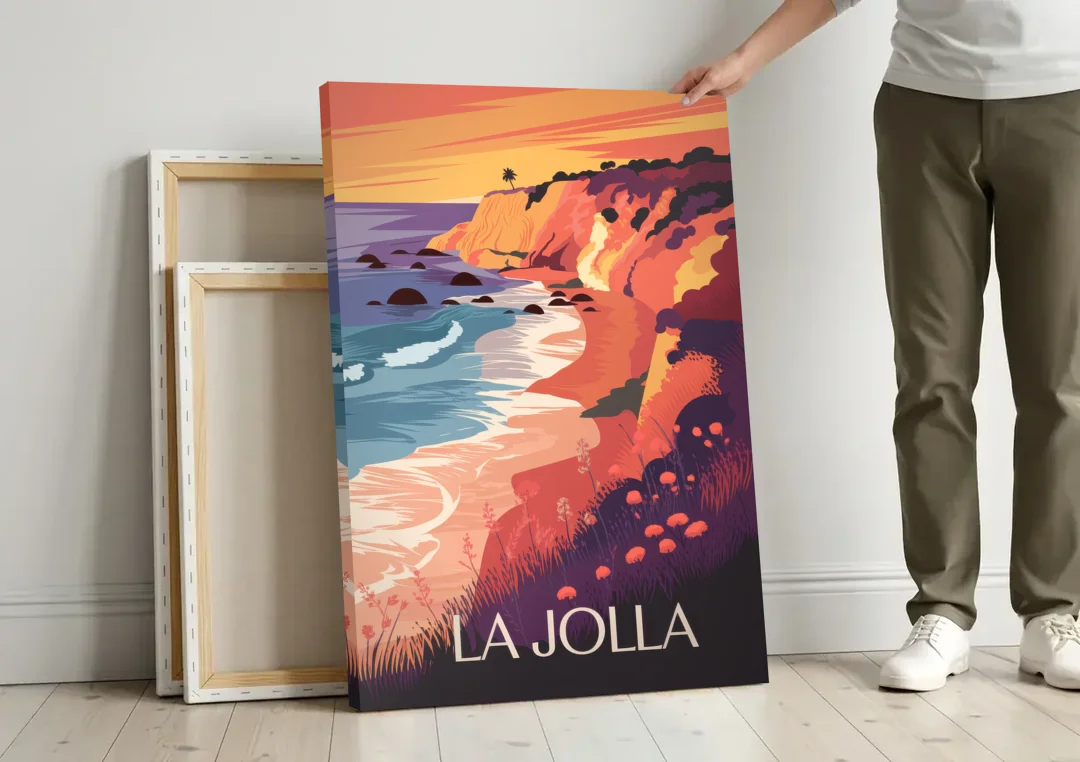 La Jolla Sunset Views canvas wall art leaning against a wall next to blank canvases