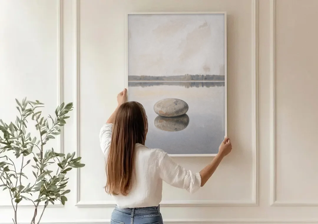 Lake Canvas Print with a Still Granite Stone canvas wall art being hung on a paneled wall
