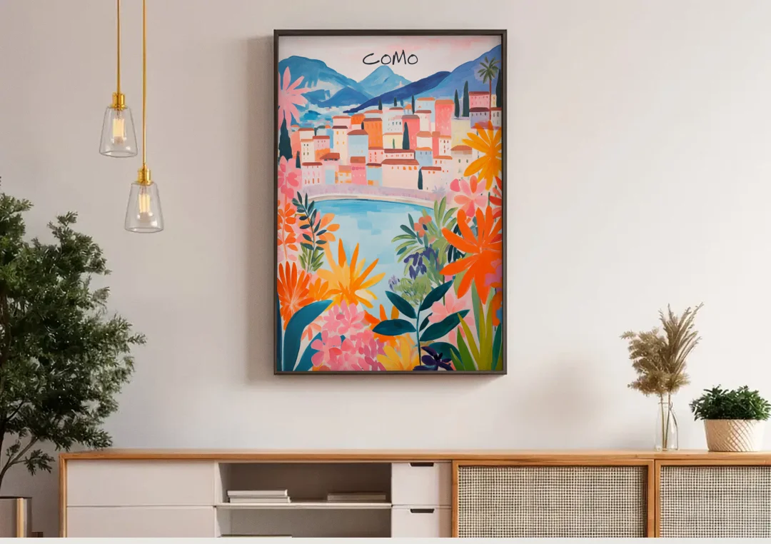 Lake Como Art in Tropical Bloom canvas wall art above a wooden sideboard under pendant lights