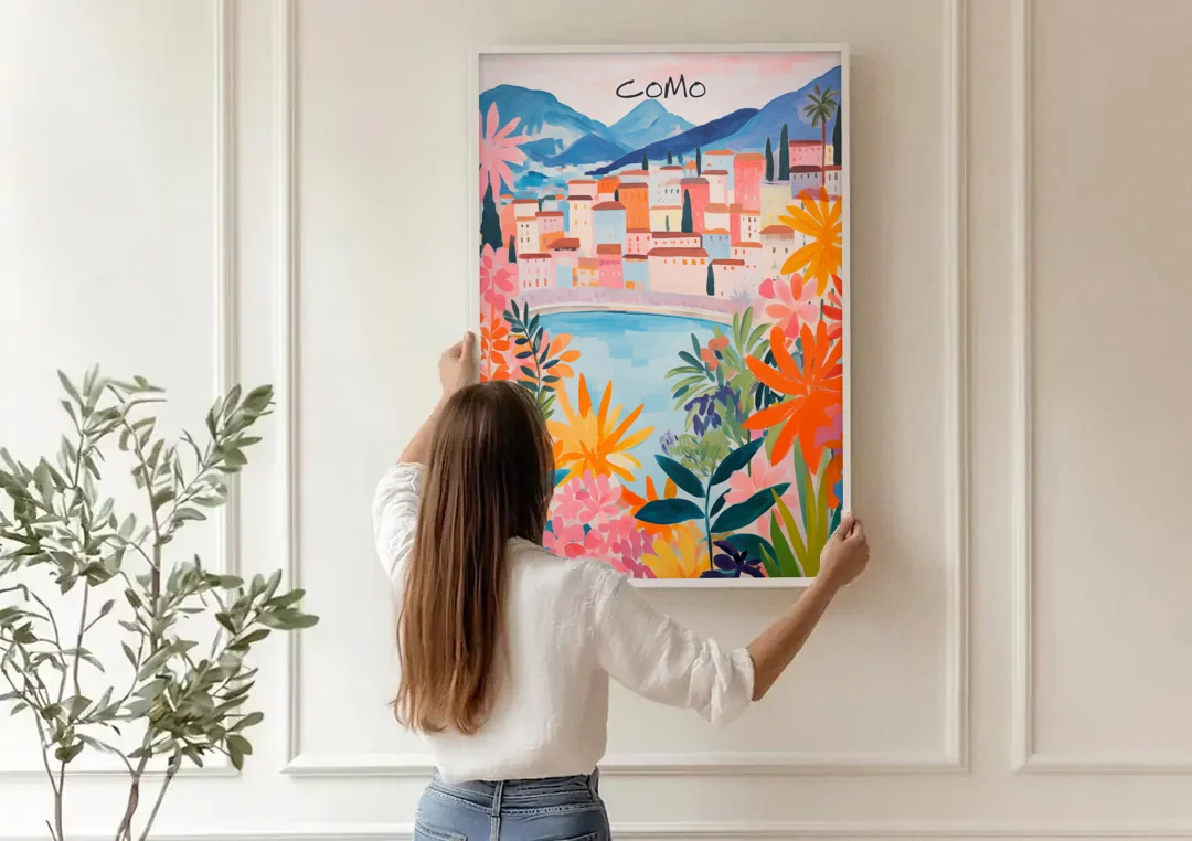 Lake Como Art in Tropical Bloom canvas wall art being hung on a paneled wall