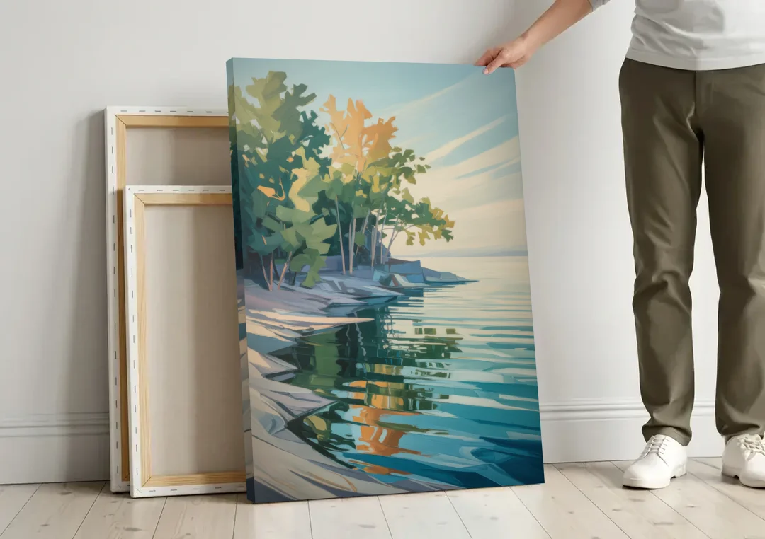 Lake Ontario Reflections canvas wall art leaning against a wall next to blank canvases
