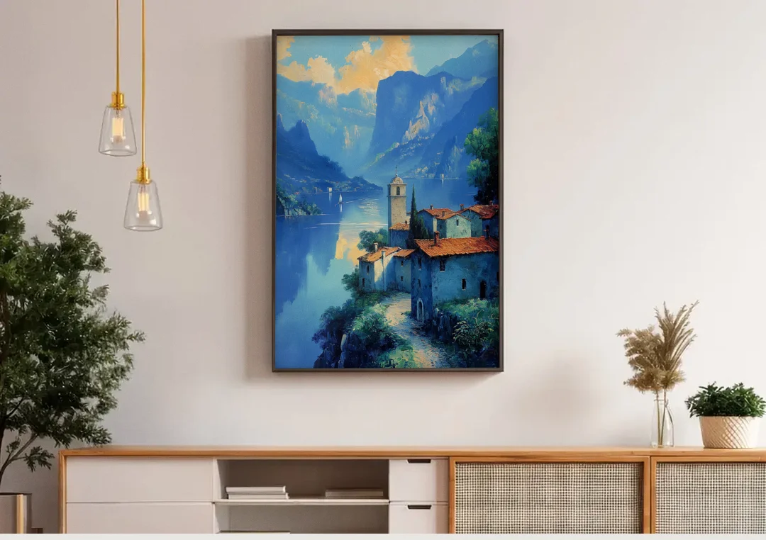 Lake Painting of Orta San Giulio canvas wall art above a wooden sideboard under pendant lights