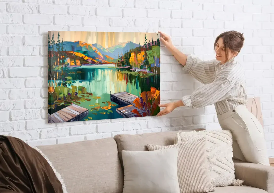 Lake Placid Mirror Lake View canvas wall art being hung on a white brick wall above a sofa