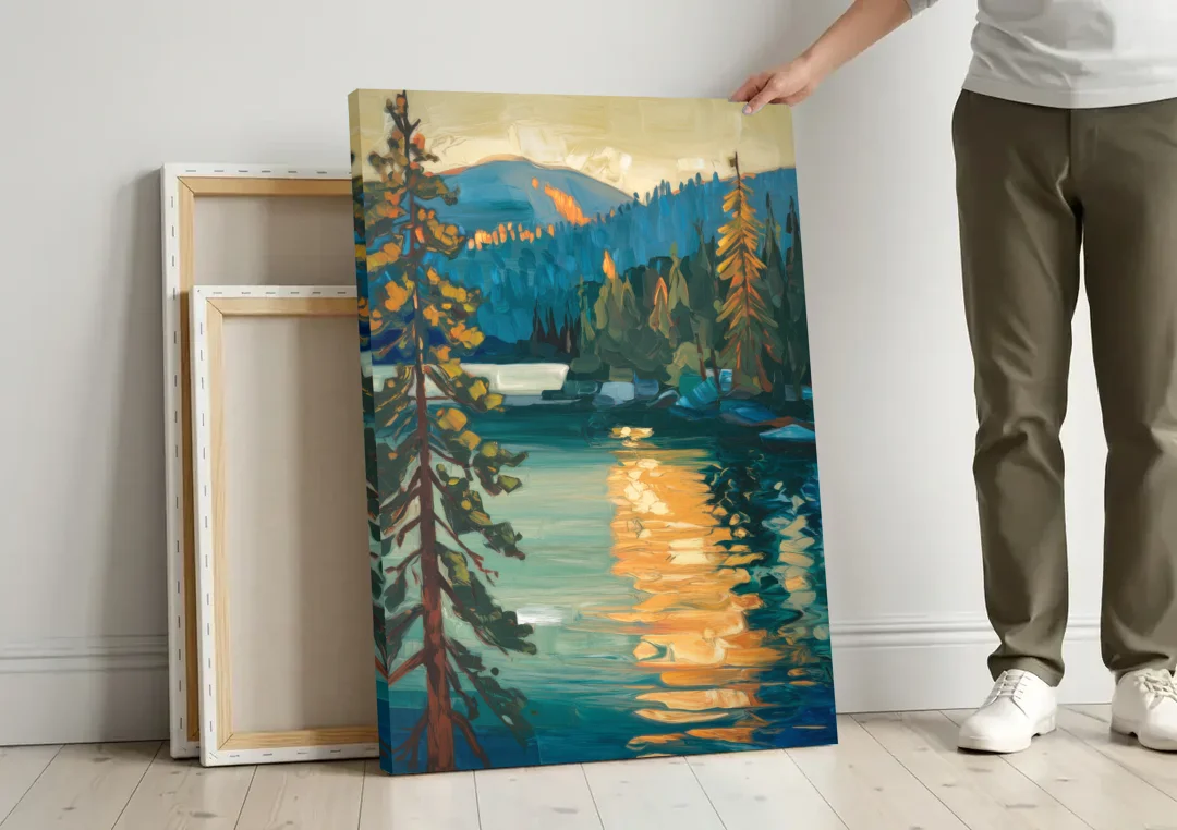 Lake Tahoe Forest Horizon canvas wall art leaning against a wall next to blank canvases