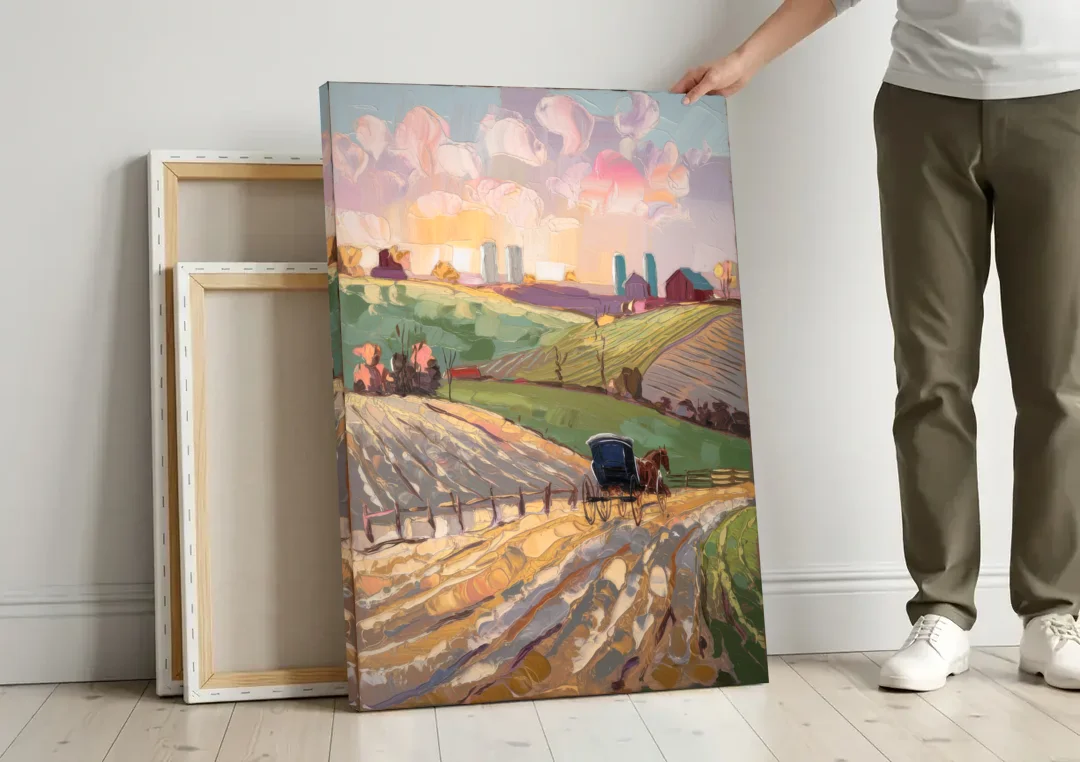 Lancaster Amish Farmlands canvas wall art leaning against a wall next to blank canvases