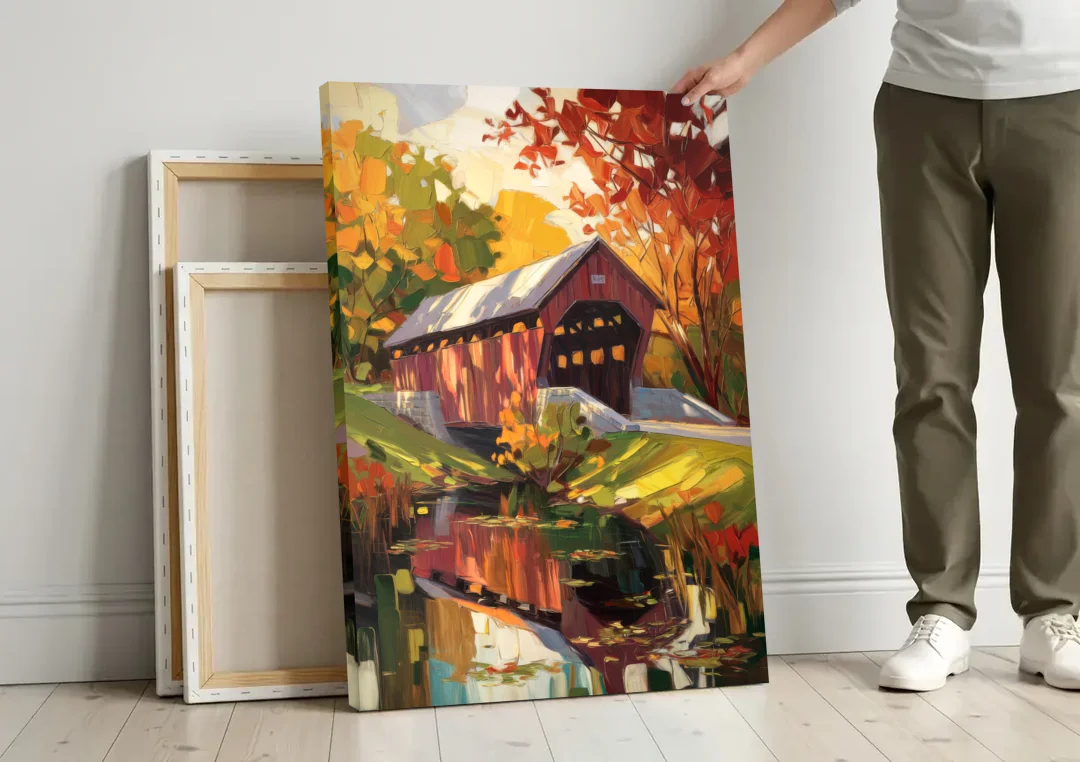 Lancaster Covered Bridges canvas wall art leaning against a wall next to blank canvases