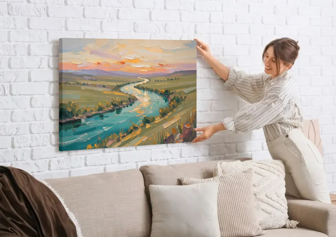 Landscape Canvas Prints Teal River at Sunset canvas wall art being hung on a white brick wall above a sofa