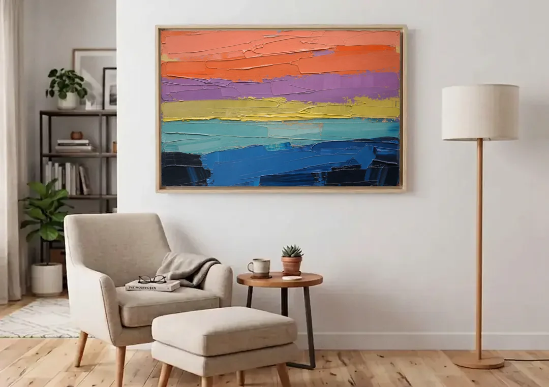 Large Abstract Coral Horizon Knife Bands canvas wall art above an armchair in a bright living room