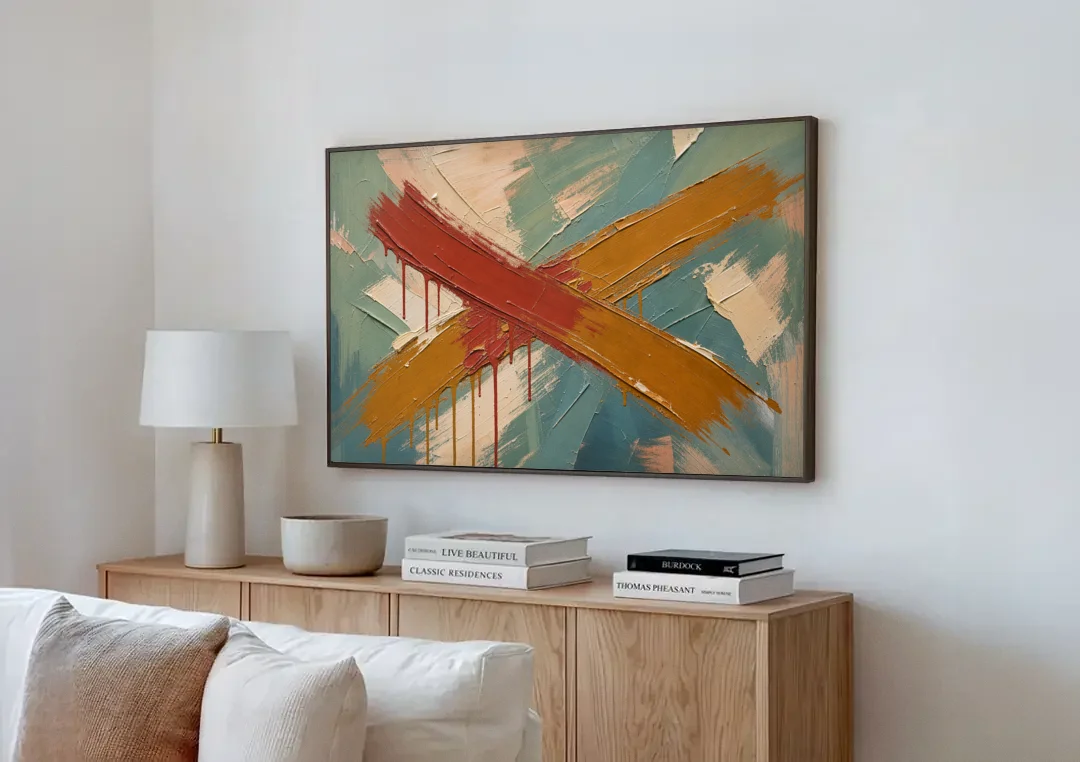 Large Abstract Crossed Red and Amber Bands canvas wall art above a wooden sideboard next to a sofa