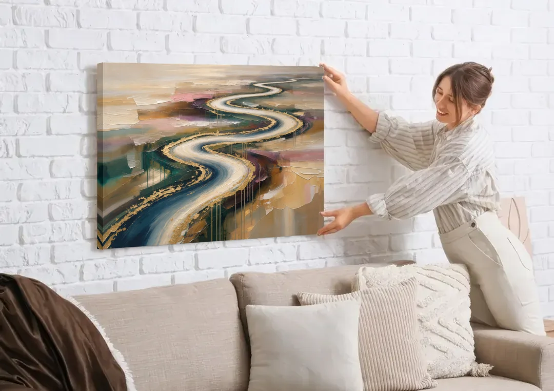 Large Abstract Gilded River Bend for the Living Room canvas wall art being hung on a white brick wall above a sofa