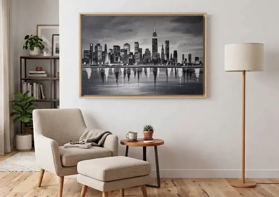 Large Black and White Wall Art for Living Room canvas wall art above an armchair in a bright living room