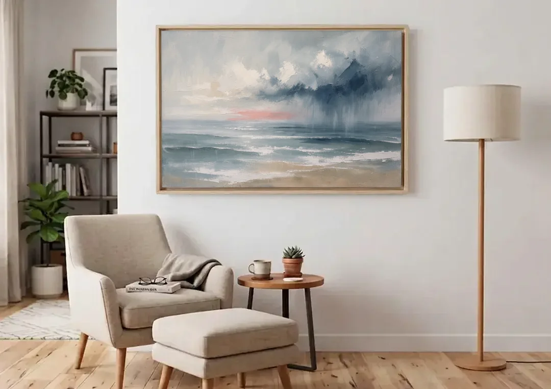 Large Coastal Wall Art of a Distant Squall canvas wall art above an armchair in a bright living room