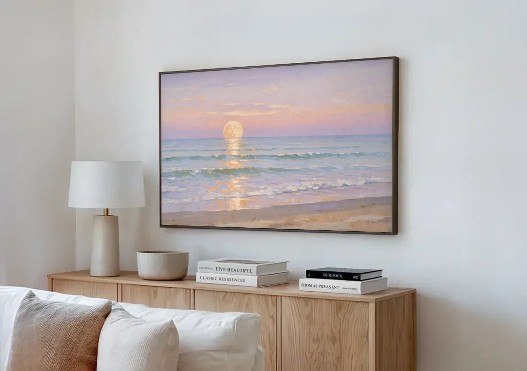 Large Golden Moonrise Over Rolling Ocean Surf canvas wall art above a wooden sideboard next to a sofa