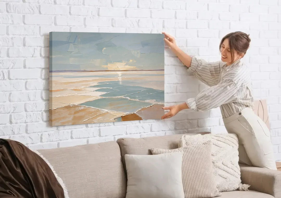 Large Neutral Salt Flat Mirror Under Misty Sky canvas wall art being hung on a white brick wall above a sofa