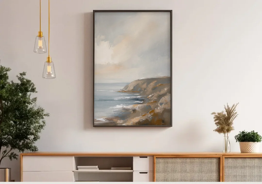 Large Vertical Wall Art of a Misty Coastal Cliff canvas wall art above a wooden sideboard under pendant lights