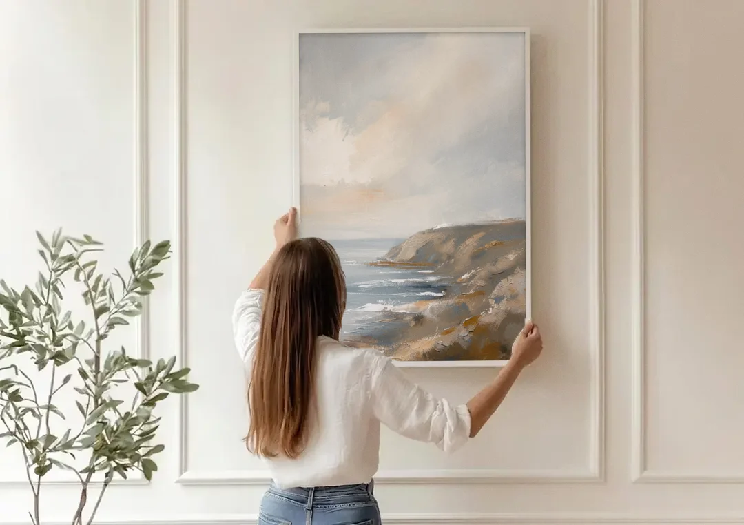 Large Vertical Wall Art of a Misty Coastal Cliff canvas wall art being hung on a paneled wall