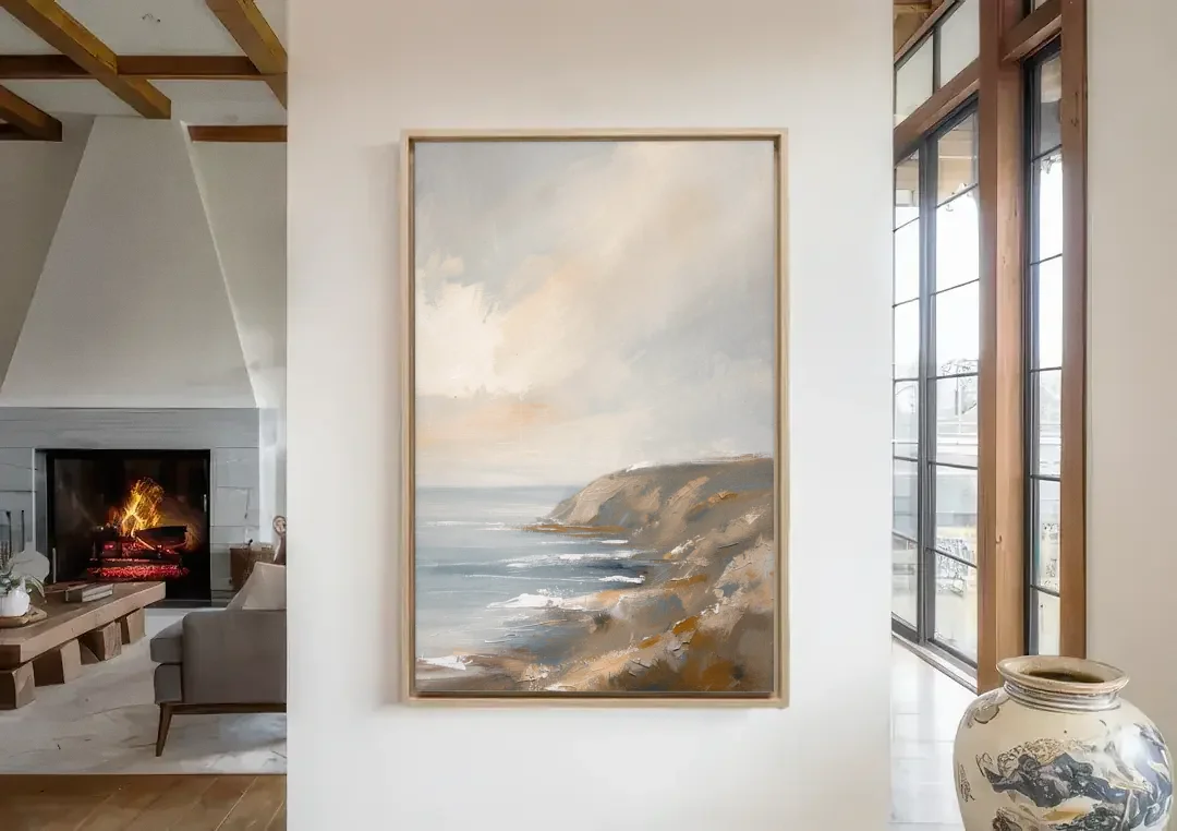 Large Vertical Wall Art of a Misty Coastal Cliff canvas wall art in a living room with a fireplace