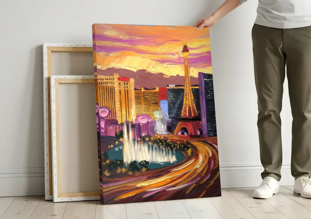 Las Vegas Skyline at Sunset canvas wall art leaning against a wall next to blank canvases