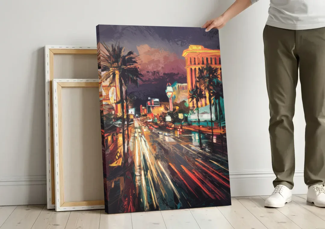 Las Vegas Strip Lights canvas wall art leaning against a wall next to blank canvases