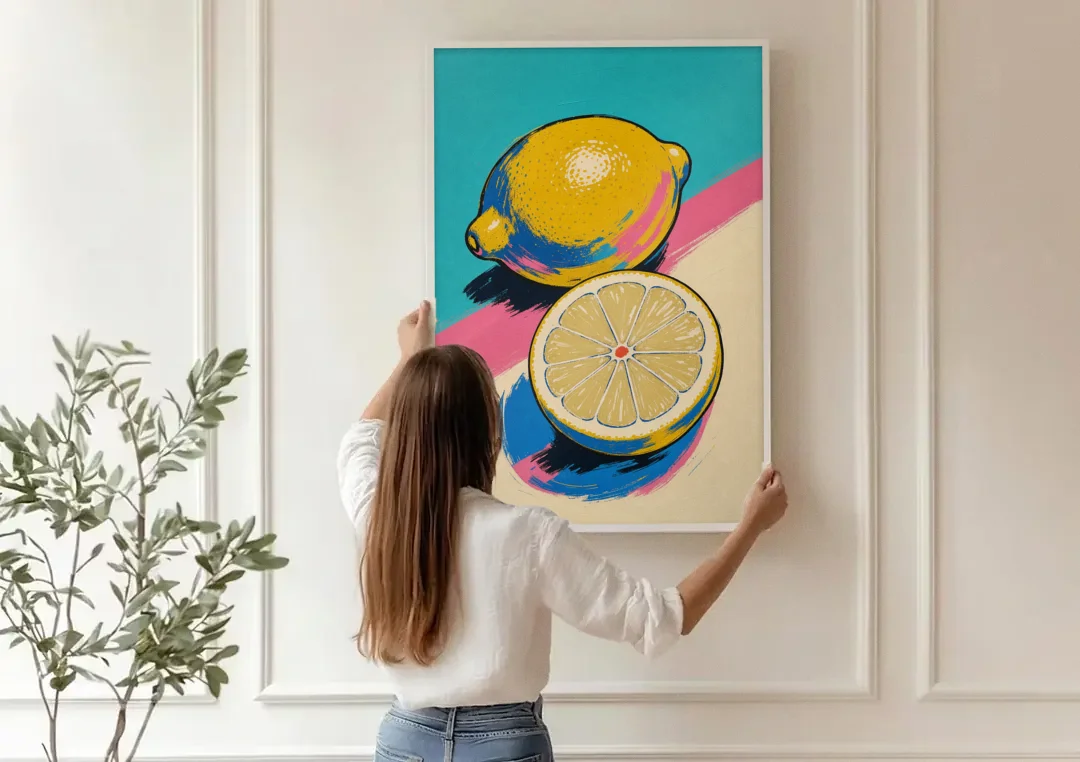 Lemon Kitchen Decor with Whole and Halved Lemons canvas wall art being hung on a paneled wall