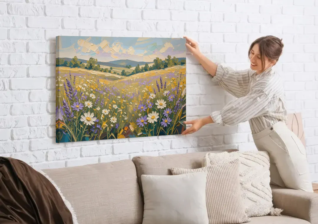 Lilac Asters in a Summer Meadow for the Bedroom canvas wall art being hung on a white brick wall above a sofa