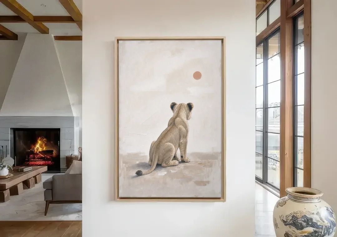 Lion Cub Gazing at a Low Pale Sun canvas wall art in a living room with a fireplace