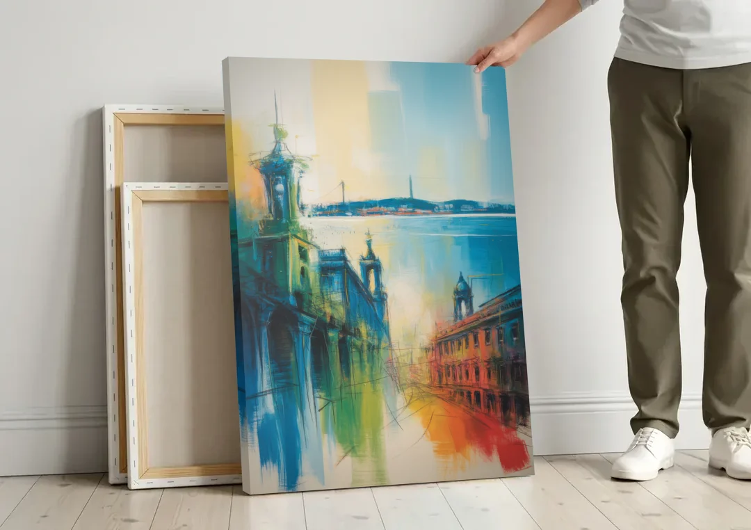 Lisbon Skyline canvas wall art leaning against a wall next to blank canvases