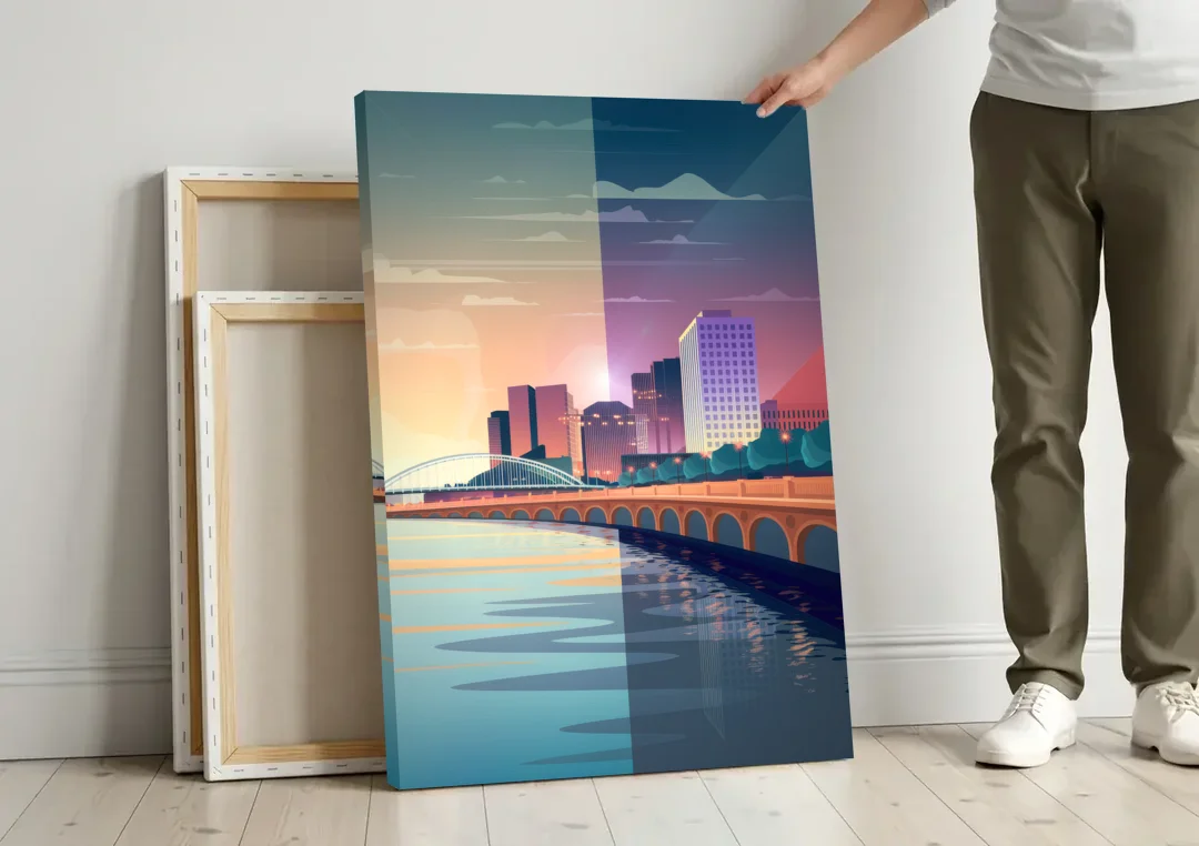 Little Rock Scenic Riverfront canvas wall art leaning against a wall next to blank canvases
