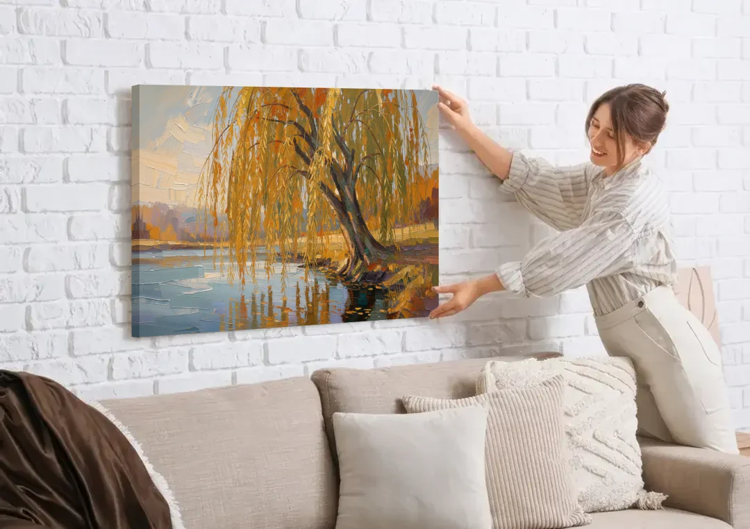 Living Room Wall Decor with Weeping Willow in Autumn canvas wall art being hung on a white brick wall above a sofa