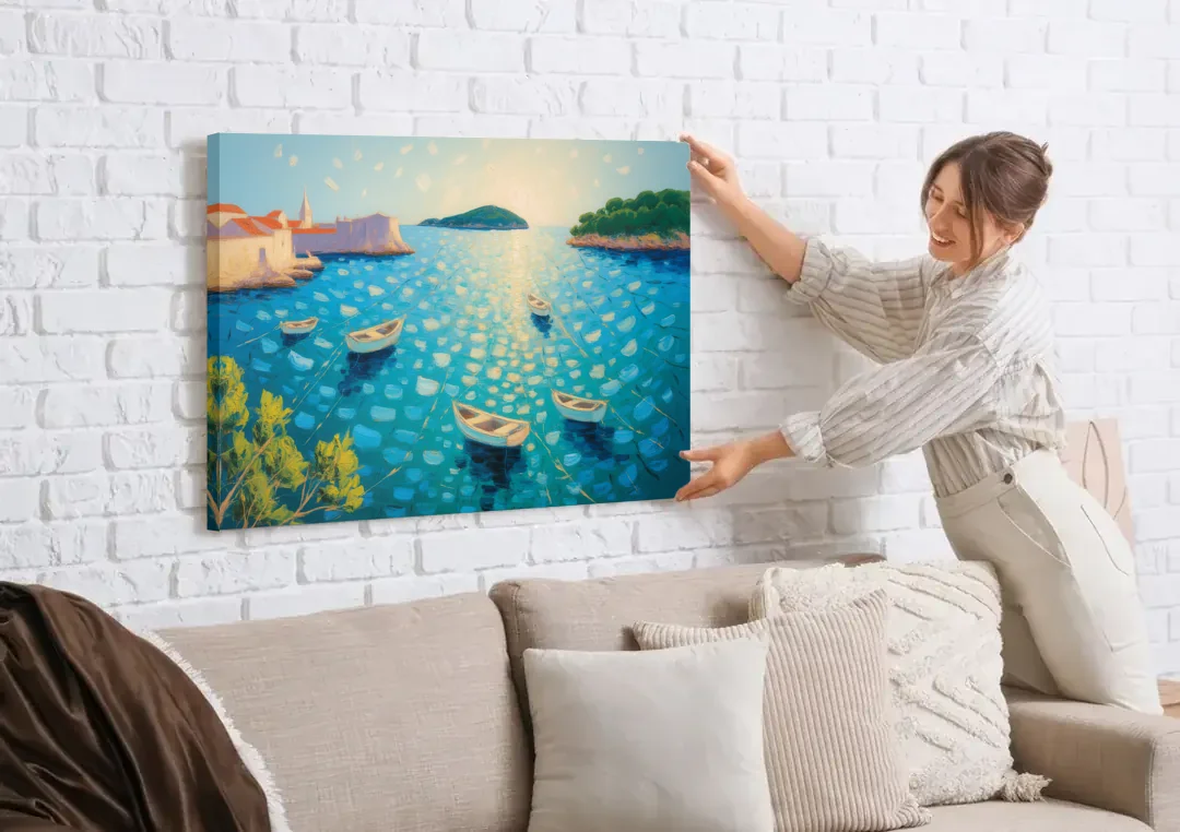 Lokrum Island Escape canvas wall art being hung on a white brick wall above a sofa