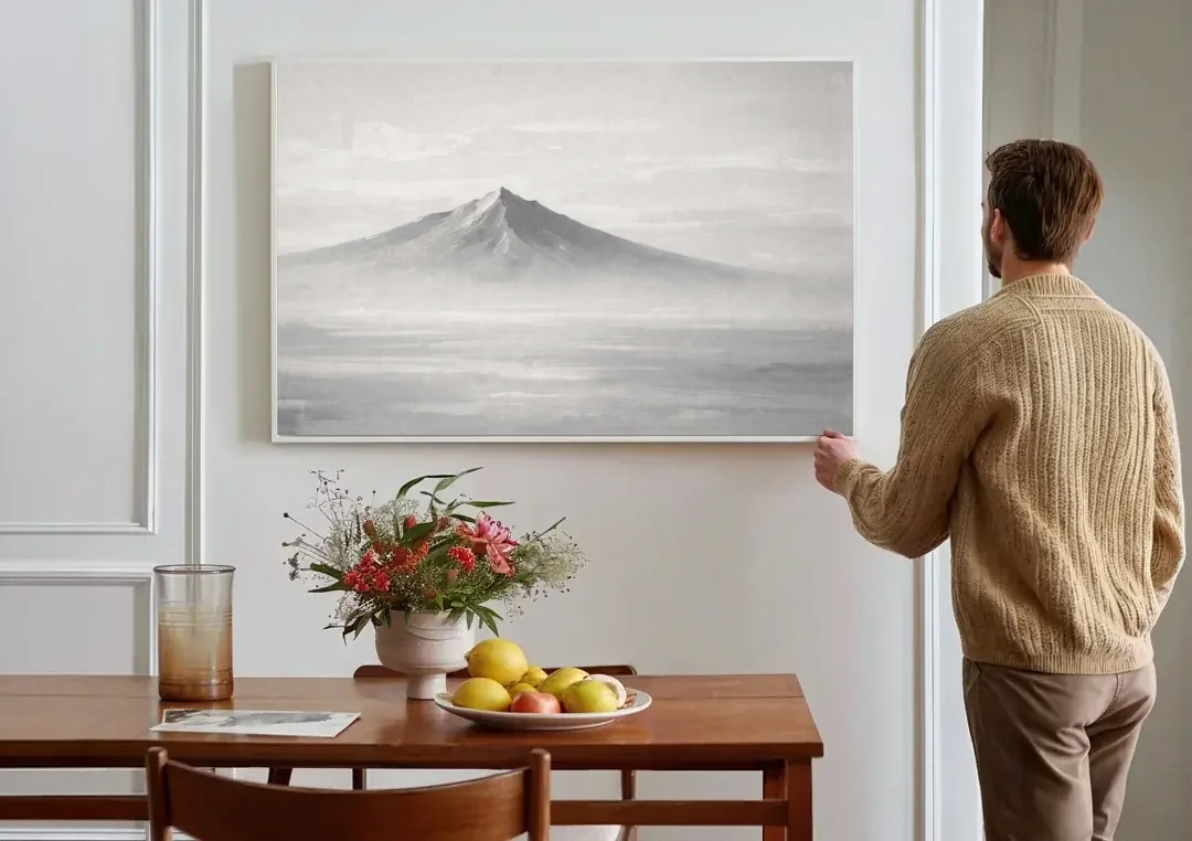 Lone Mountain Peak Above a Sea of Mist canvas wall art above a dining table
