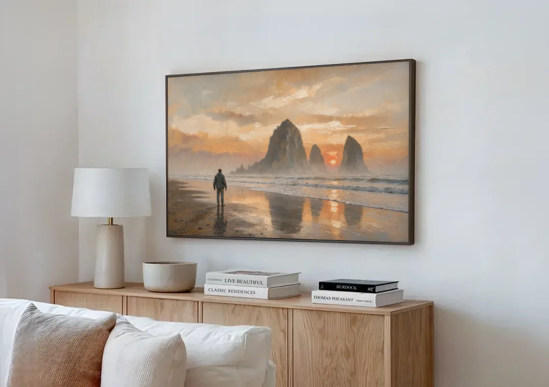 Lone Walker Facing Sea Stacks at Sunset canvas wall art above a wooden sideboard next to a sofa