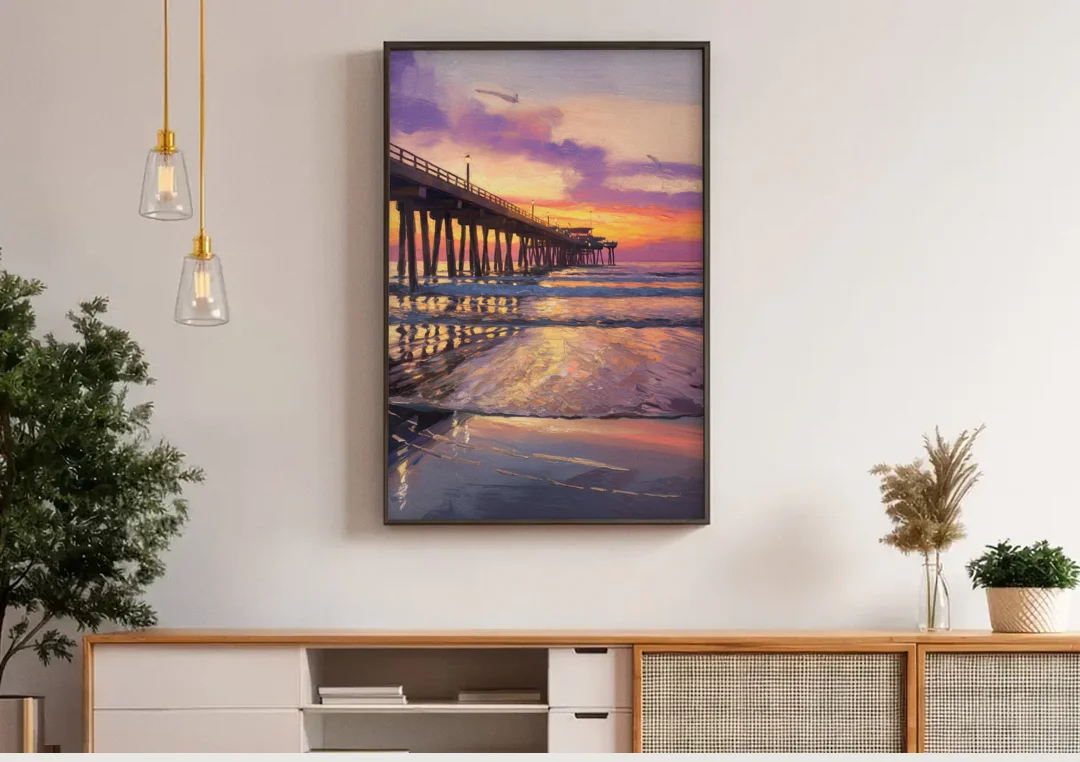 Long Beach Pier at Sunset canvas wall art above a wooden sideboard under pendant lights