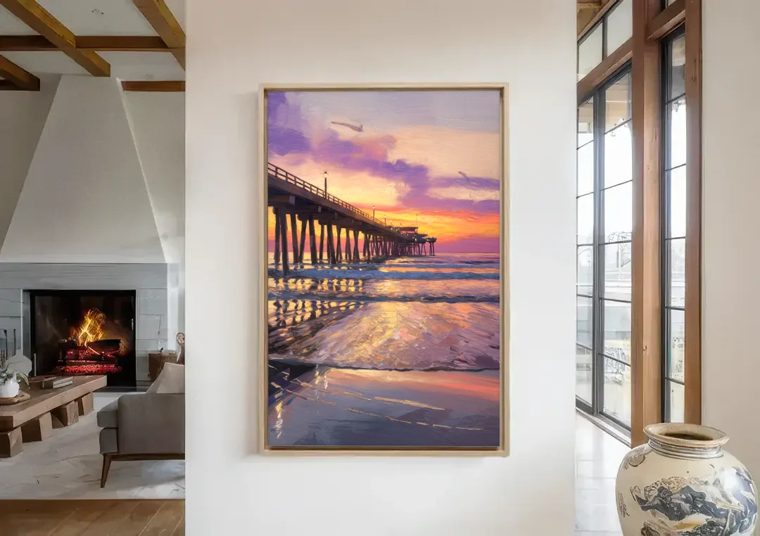 Long Beach Pier at Sunset canvas wall art in a living room with a fireplace