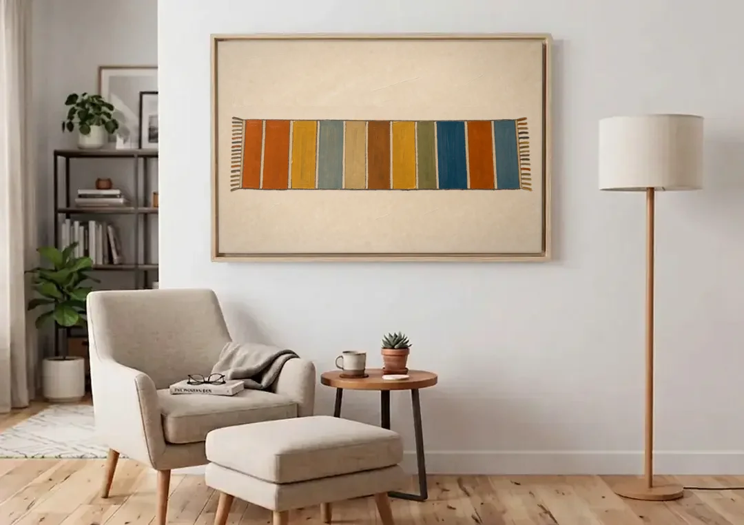 Long Narrow Wall Art of a Painted Rug Runner canvas wall art above an armchair in a bright living room