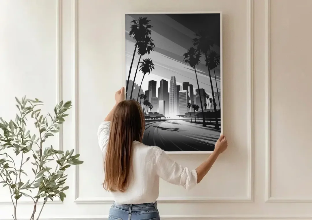 Los Angeles Black and White Cityscape Monochrome canvas wall art being hung on a paneled wall