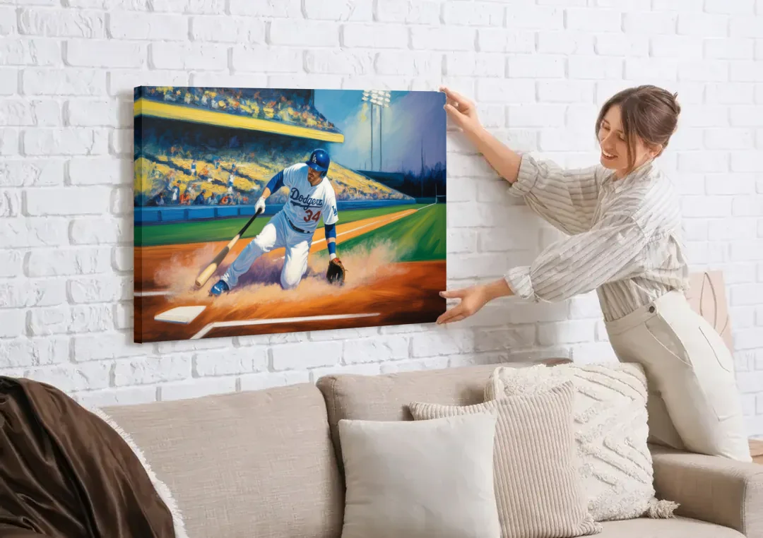 Los Angeles Dodgers Sliding Safe canvas wall art being hung on a white brick wall above a sofa