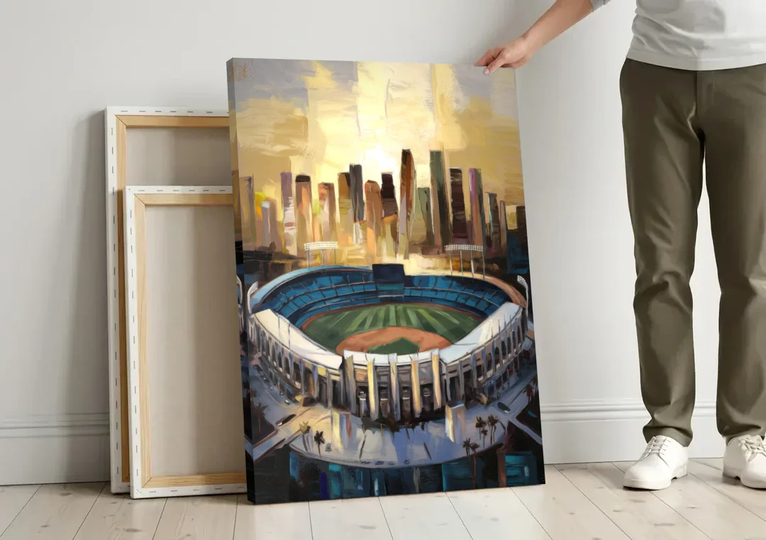 Los Angeles Dodgers Stadium canvas wall art leaning against a wall next to blank canvases