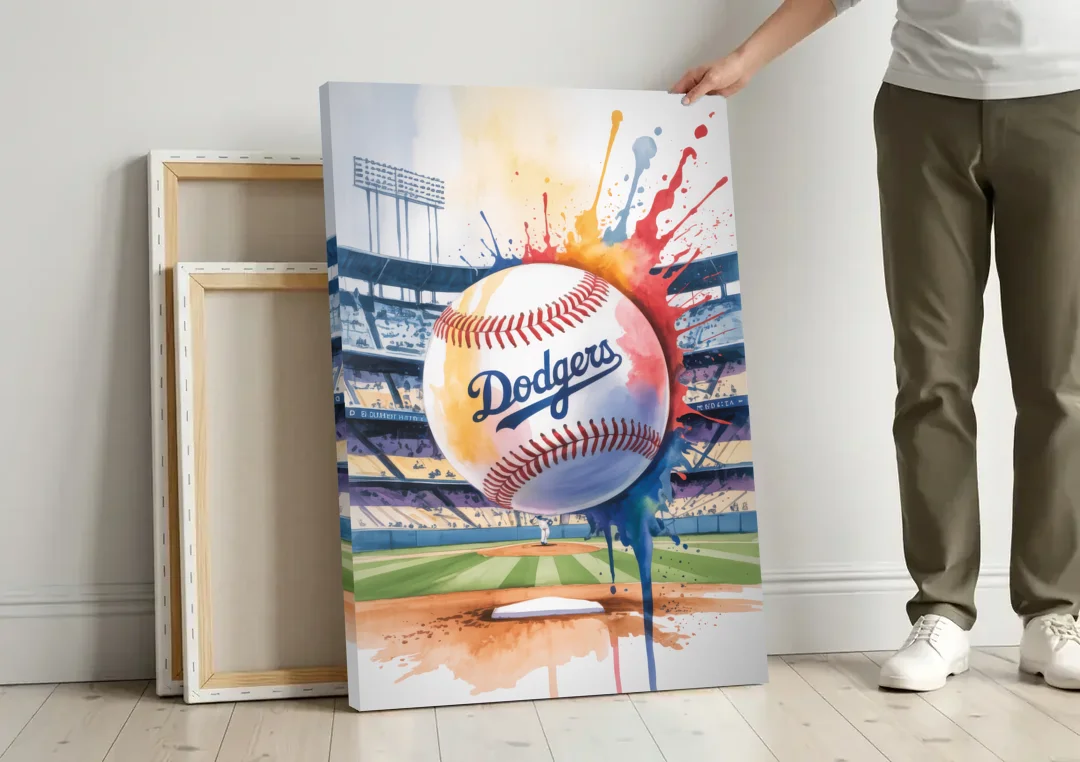 Los Angeles Dodgers Watercolor Baseball Action Art canvas wall art leaning against a wall next to blank canvases