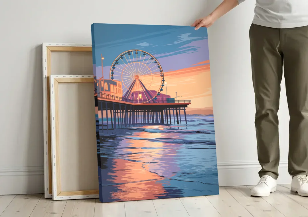 Los Angeles Santa Monica Pier canvas wall art leaning against a wall next to blank canvases