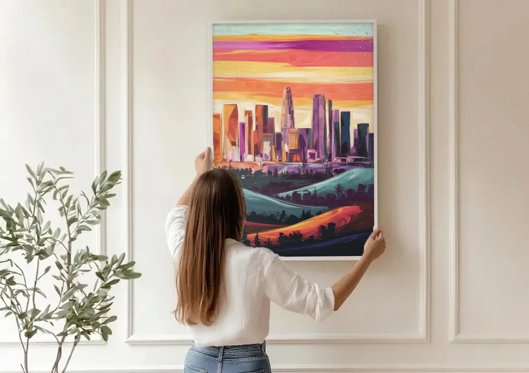 Los Angeles Skyline at Sunset canvas wall art being hung on a paneled wall