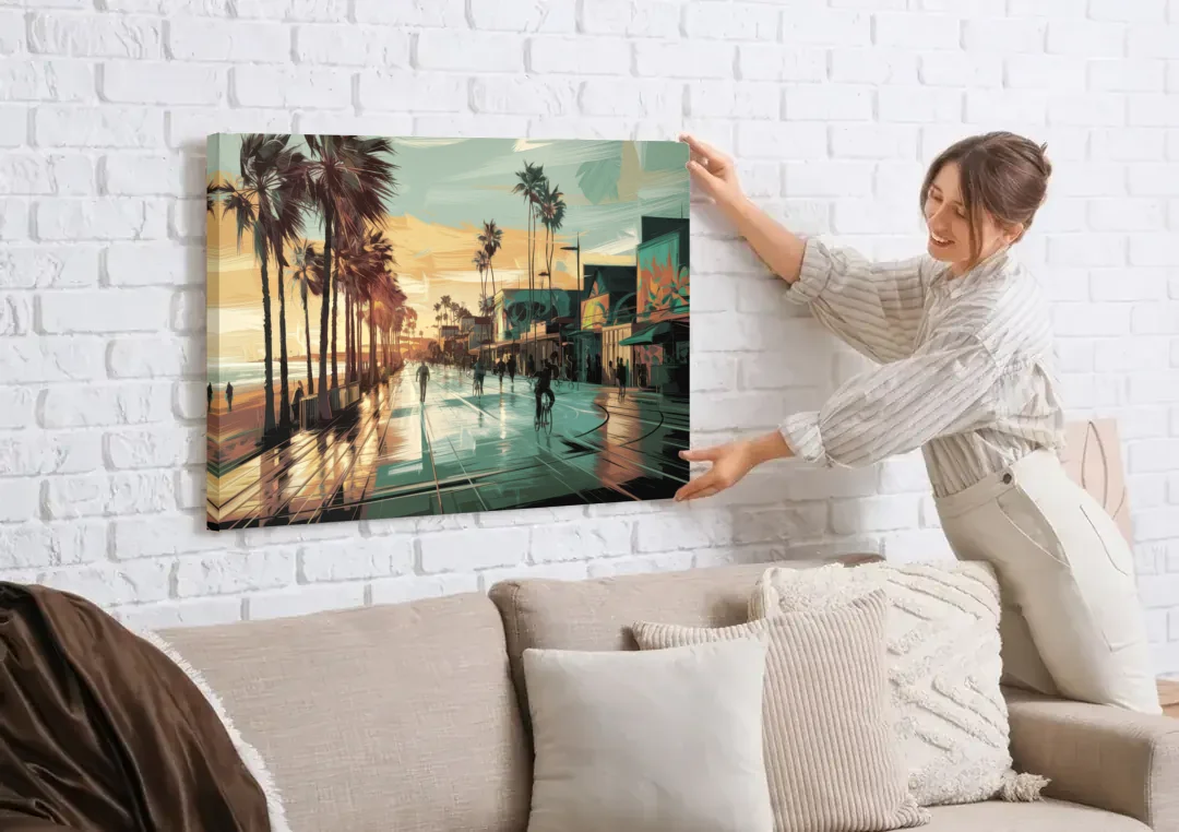 Los Angeles Venice Beach Boardwalk canvas wall art being hung on a white brick wall above a sofa