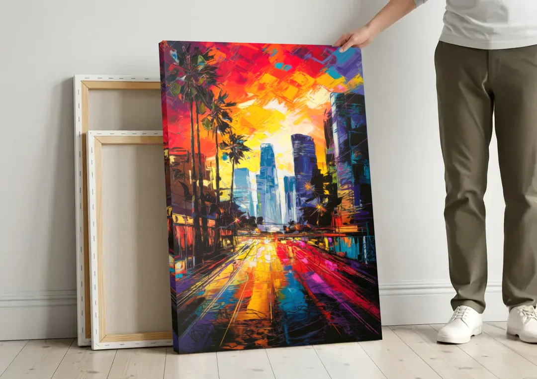Los Angeles Vibrant Street Art canvas wall art leaning against a wall next to blank canvases